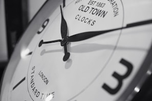 A close-up of a retro clock with a classic design.