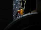 Close-up of a professional installer securing strength equipment in place.