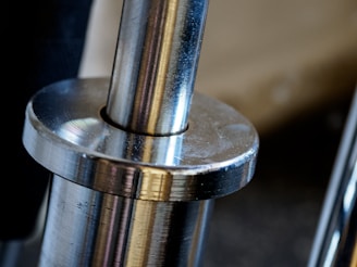 silver and gold steel tube