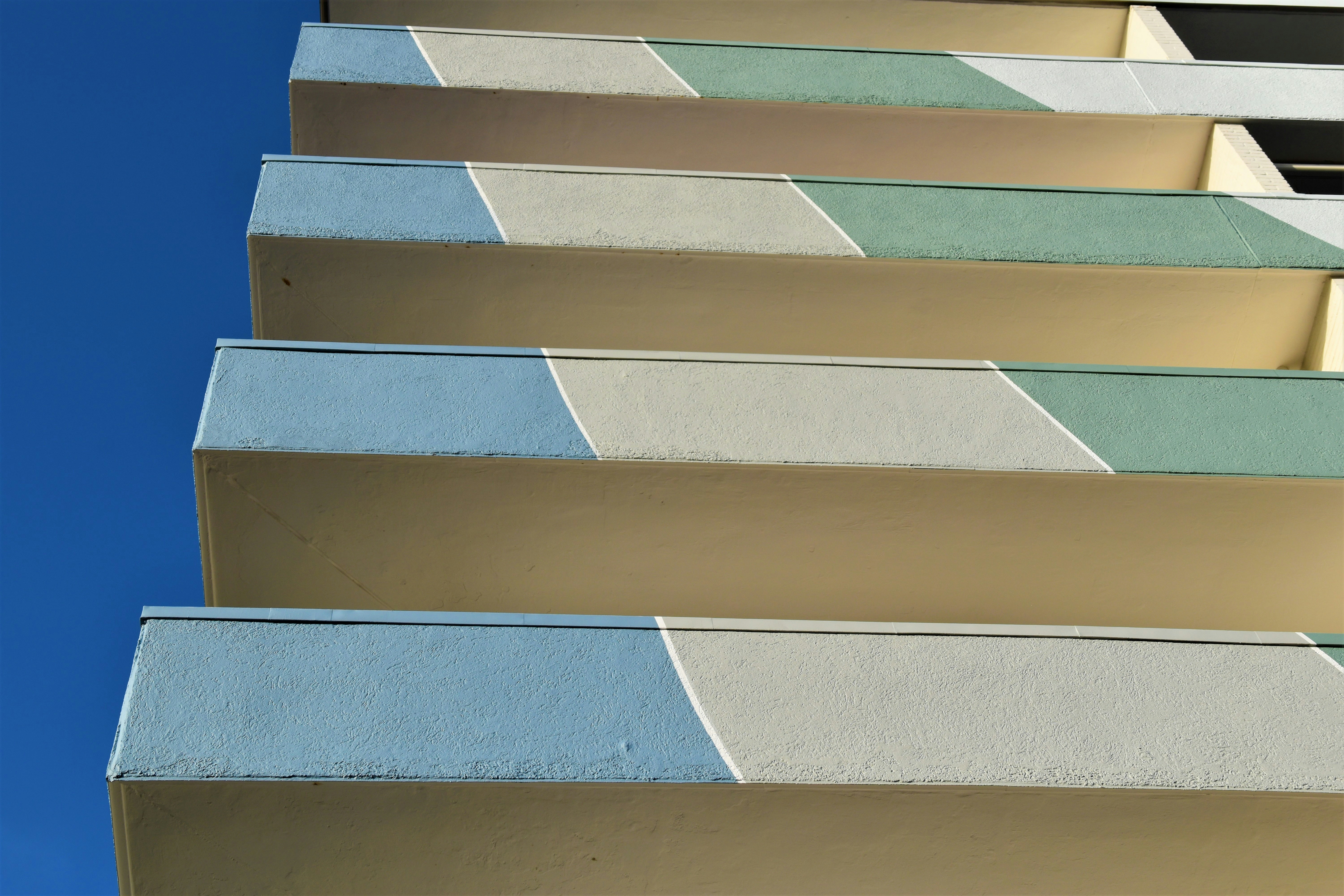 pastel balconies of an apartment building