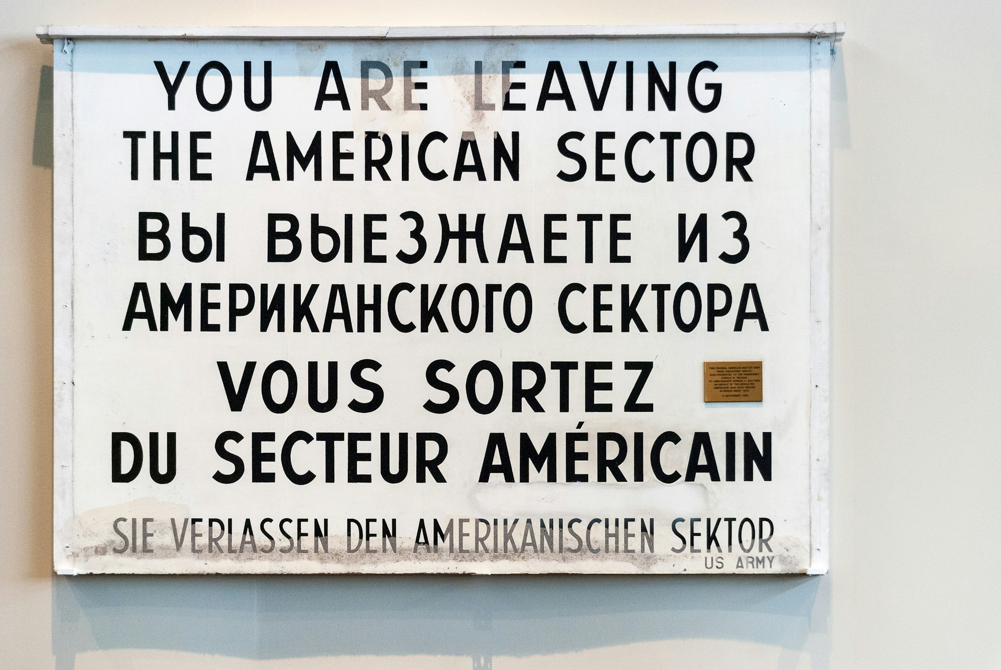 »You are leaving the american sector«. Berlin sign at Checkpoint Charlie before the fall of the wall in 1989.