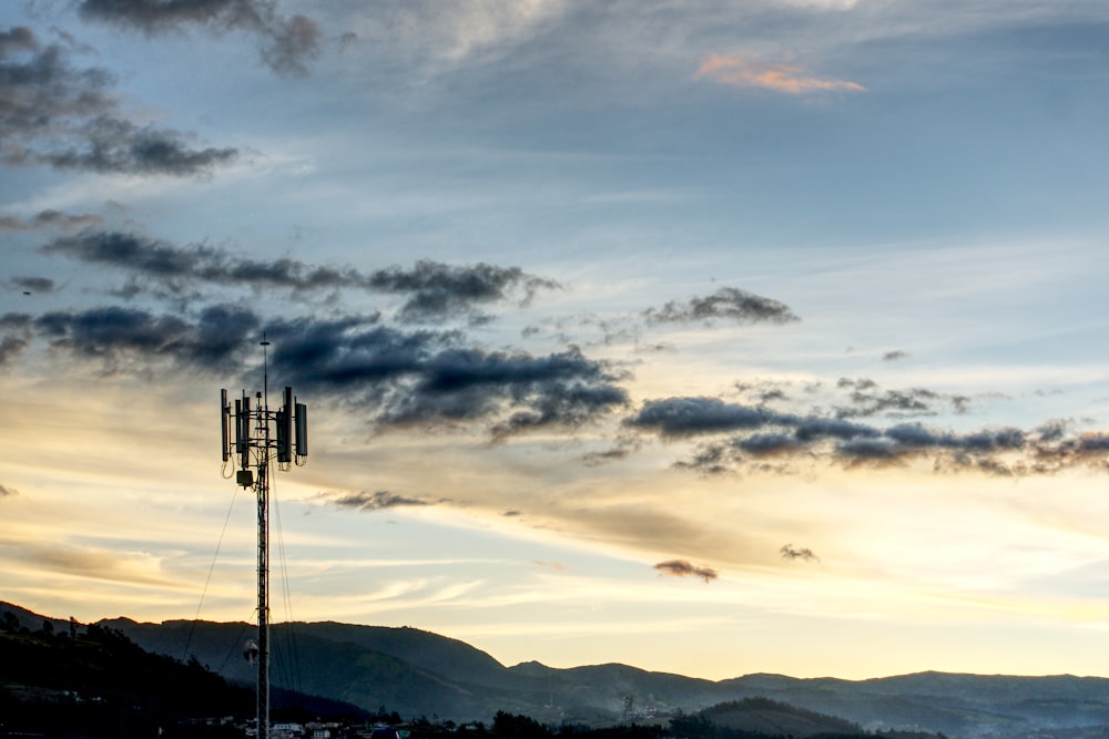 black cable cars over the mountains during daytime