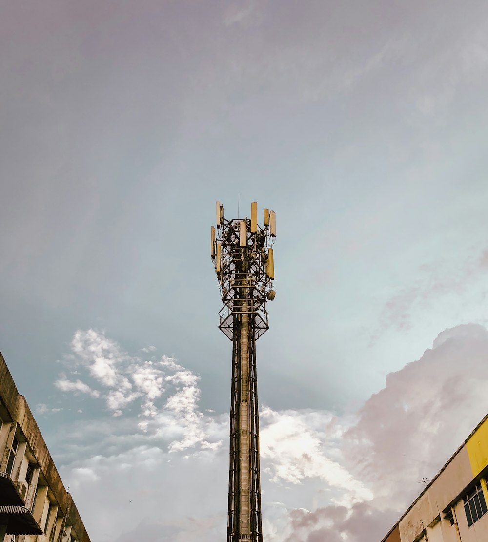 gray tower under cloudy sky during daytime