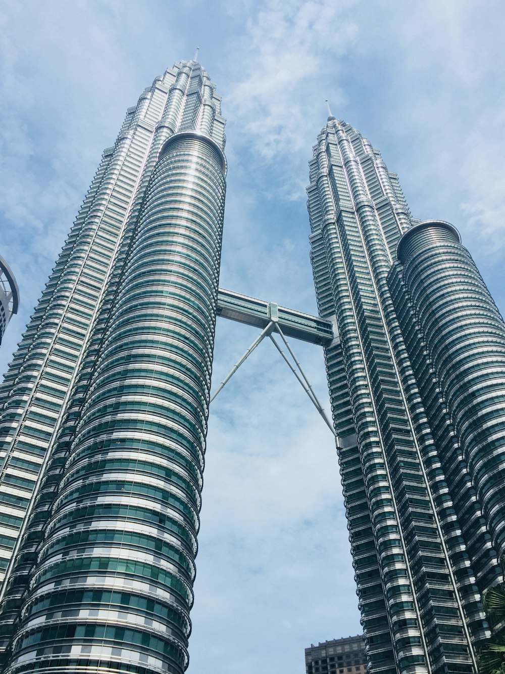 low angle photography of gray high rise building