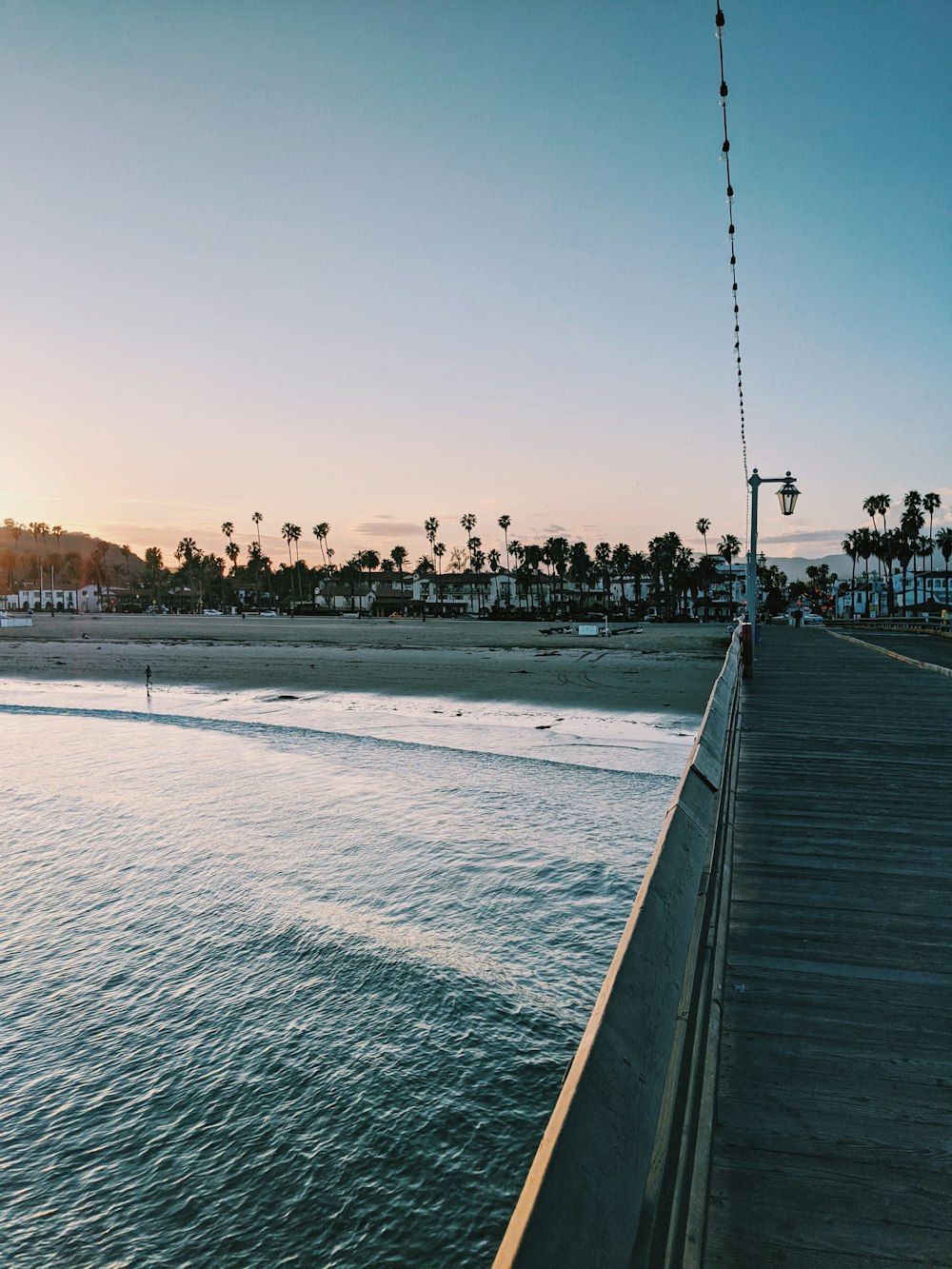 people walking on beach during daytime