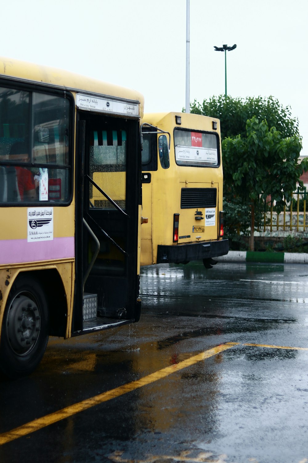 yellow bus on road during daytime