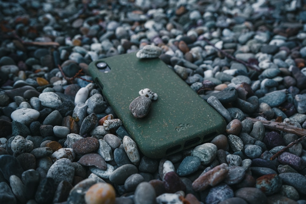 black and gray stones on gray and white pebbles