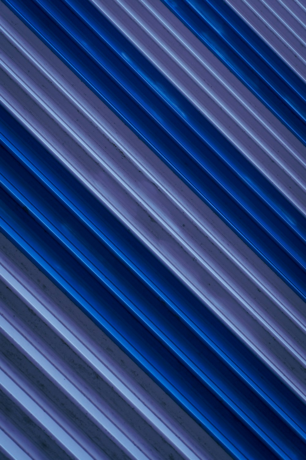 blue white and brown striped textile