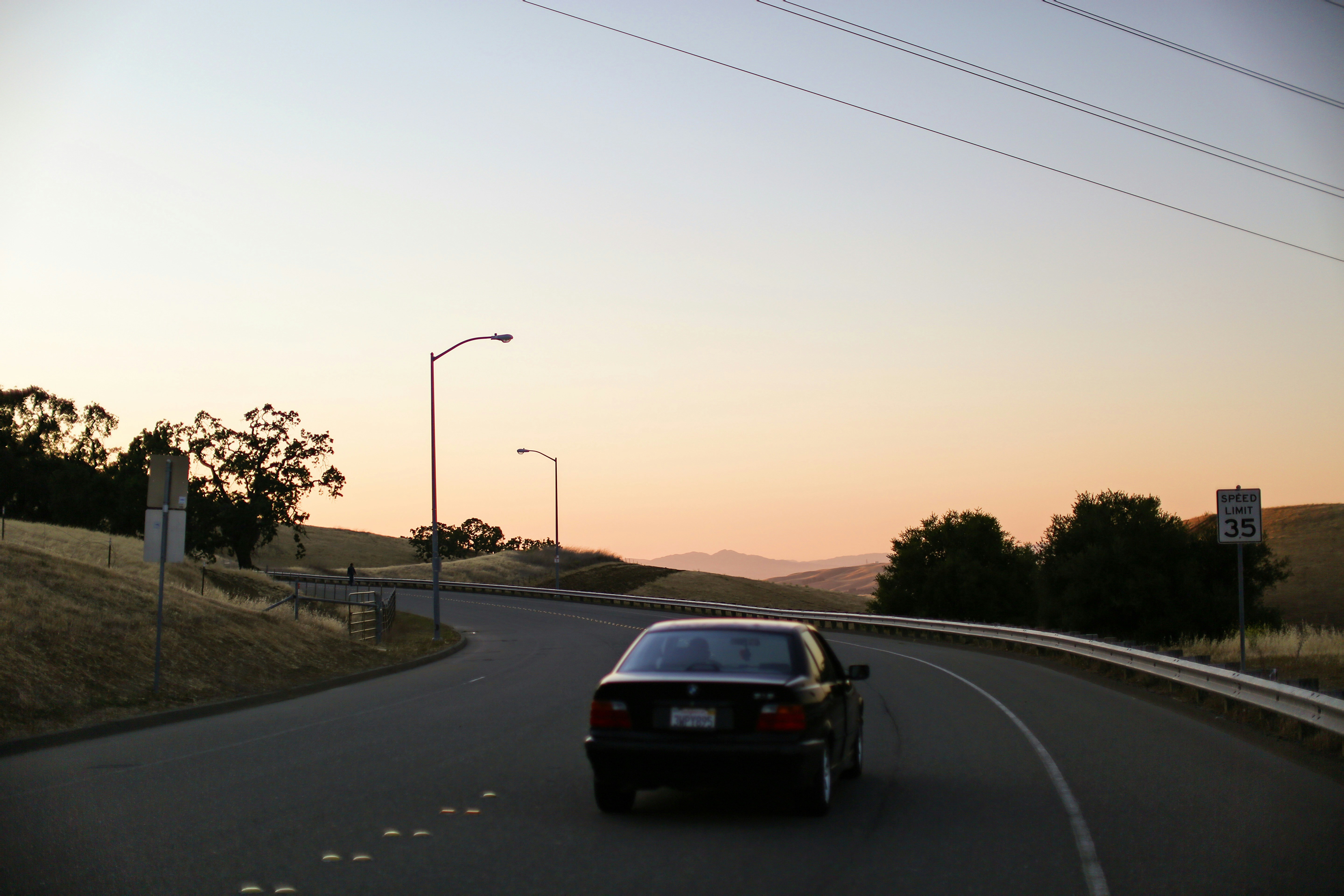 black car on road during daytime