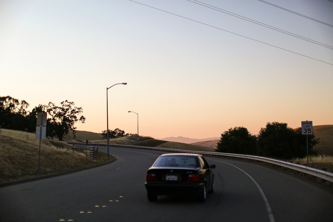 black car on road during daytime