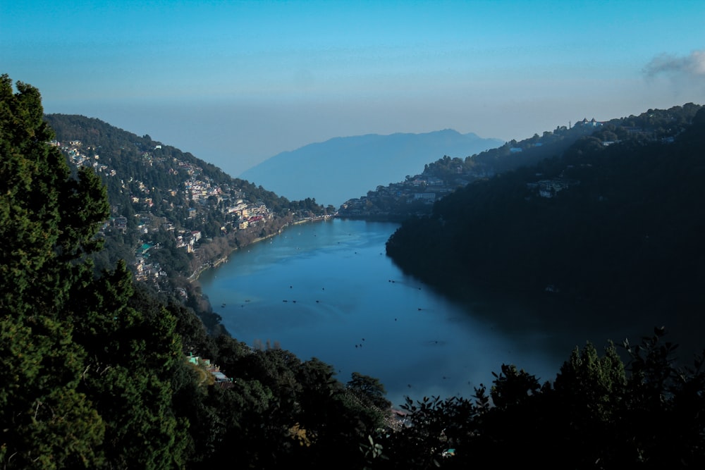 aerial view of lake and mountains during daytime