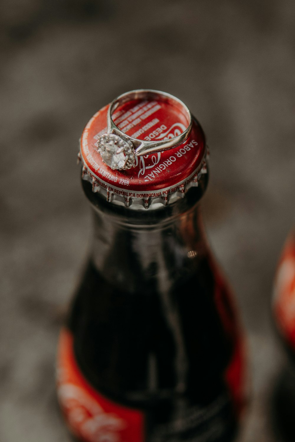 coca cola bottle in close up photography