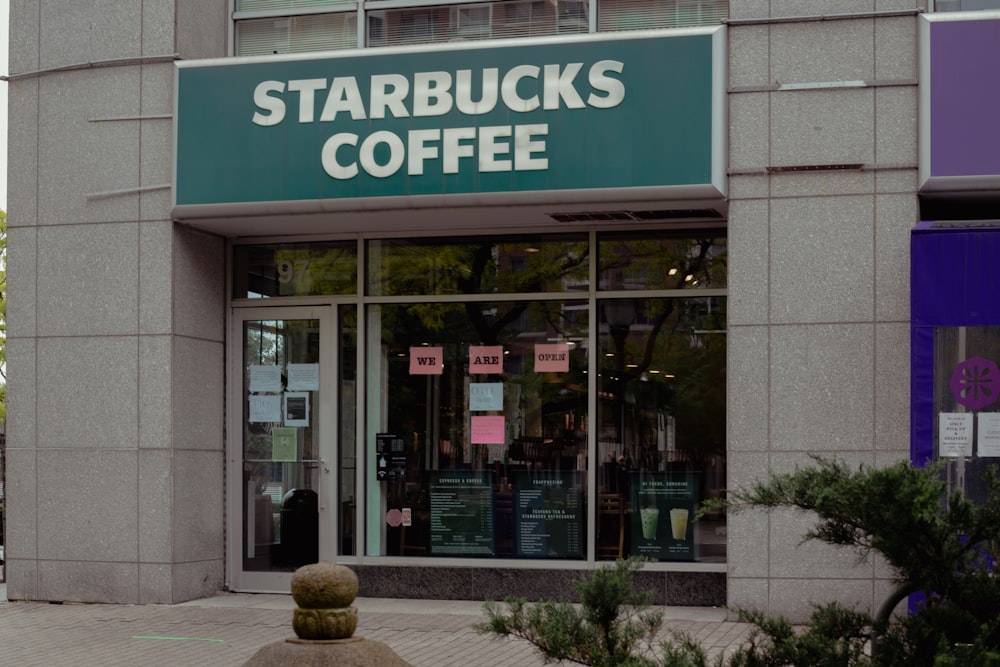 a starbucks coffee shop on a city street