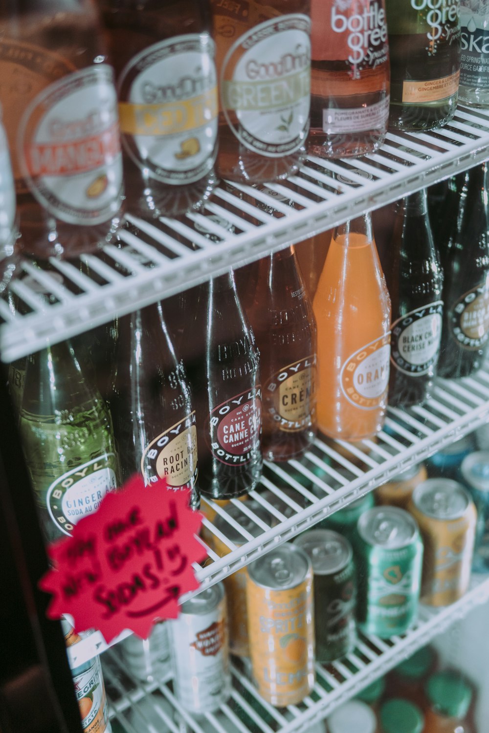 orange and green labeled bottles