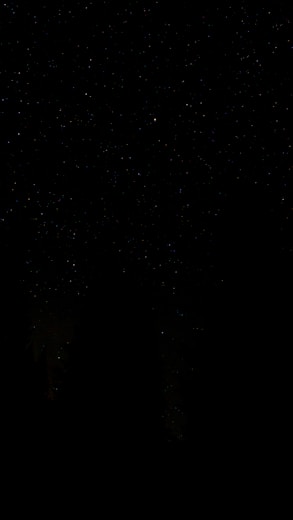 black textile on black background