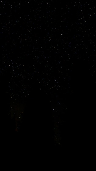 black textile on black background