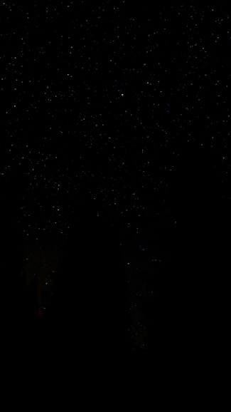 black textile on black background