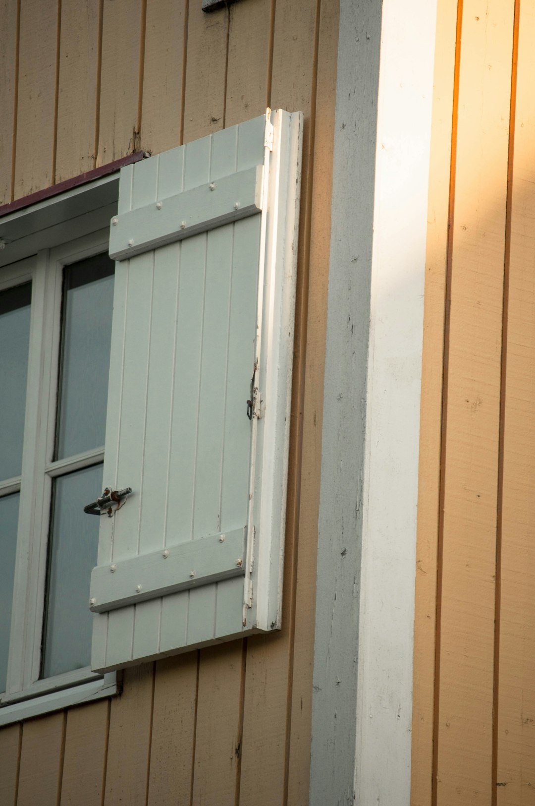 white wooden door with silver door lever