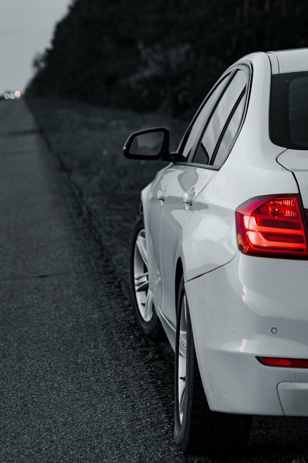 white bmw m 3 on road during daytime