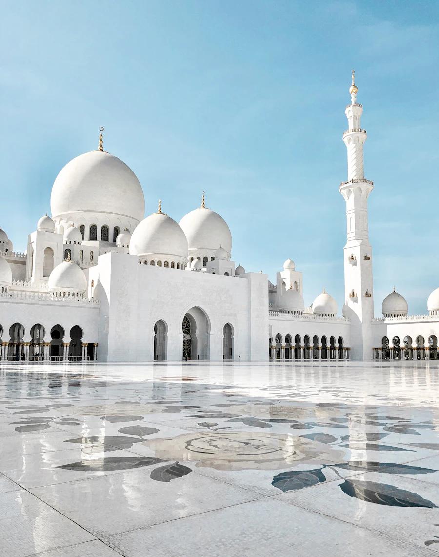 Detail of a mosque interior with green and gold arches