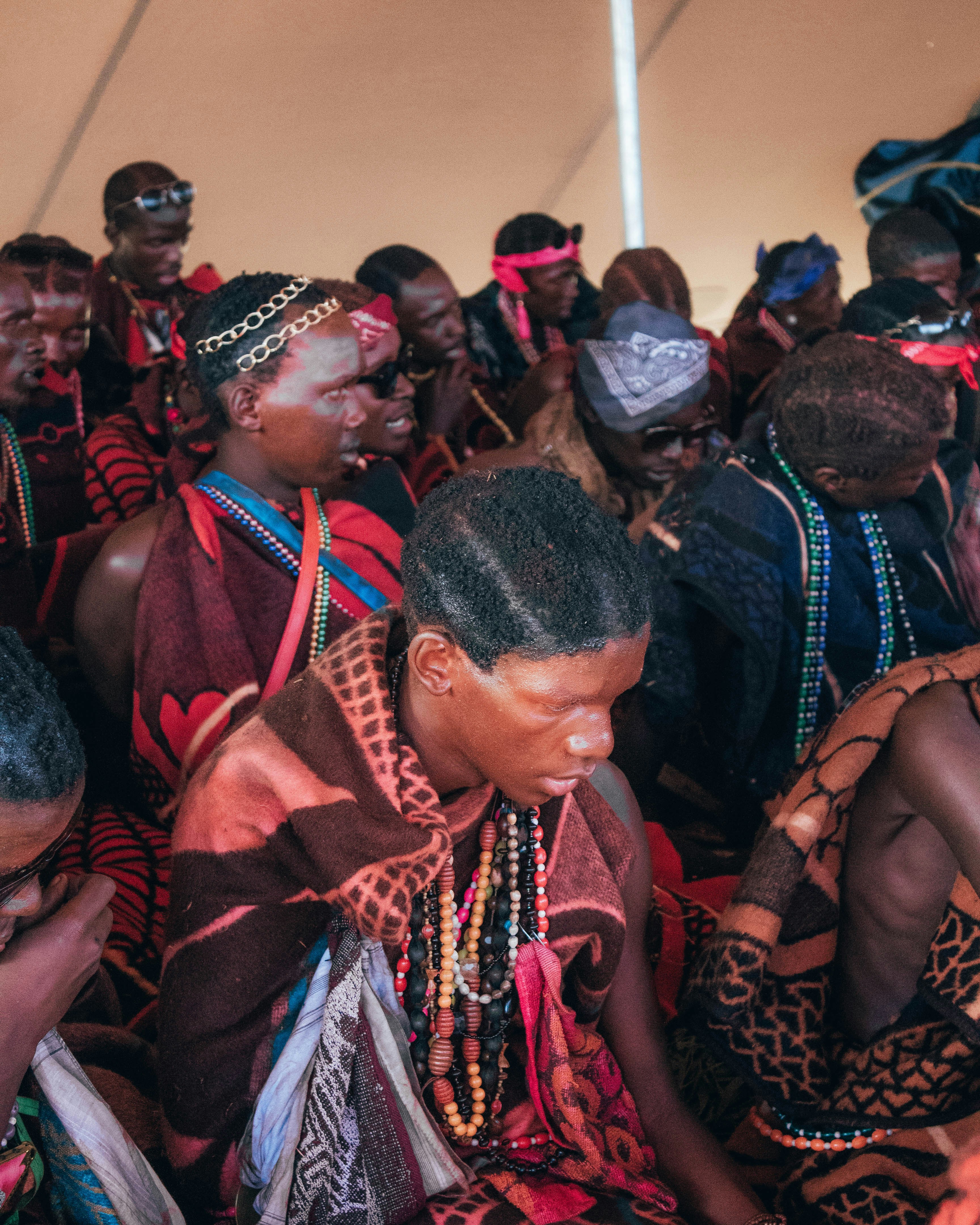 woman in red and black scarf