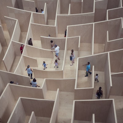 people sitting on white concrete stairs