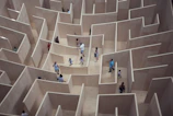 Children playing inside the maze beneath the Endeavour replica ship.