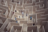 people sitting on white concrete stairs