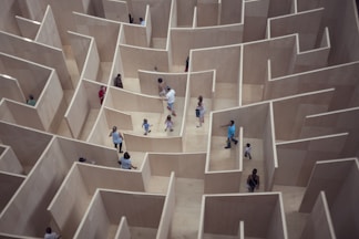 people sitting on white concrete stairs