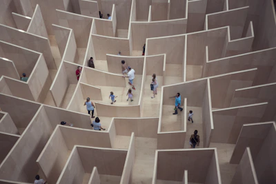 Children playing inside the maze beneath the Endeavour replica ship.
