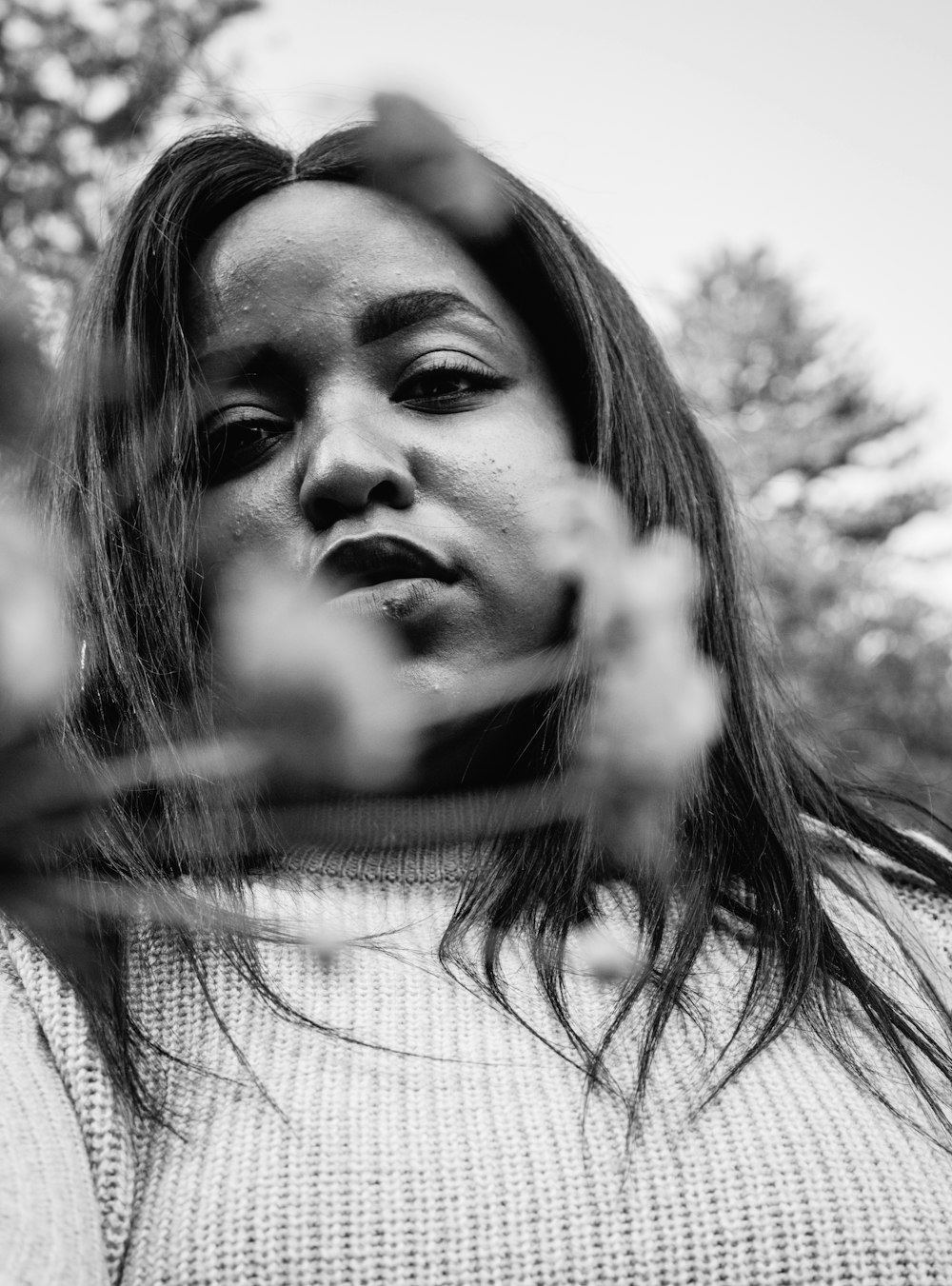 grayscale photo of woman with long hair