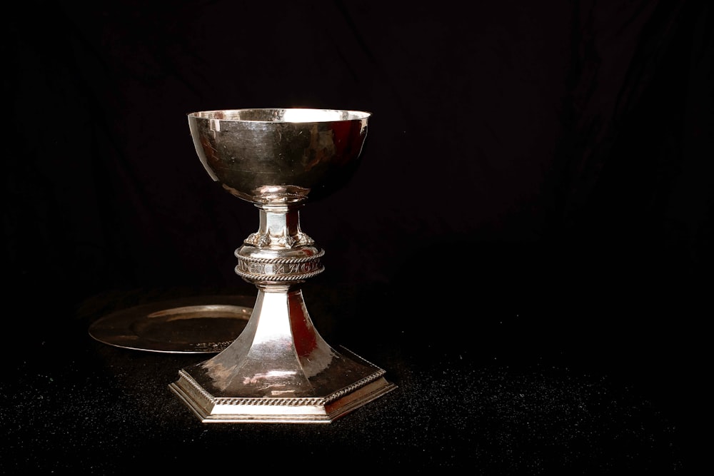 gold footed glass on black table