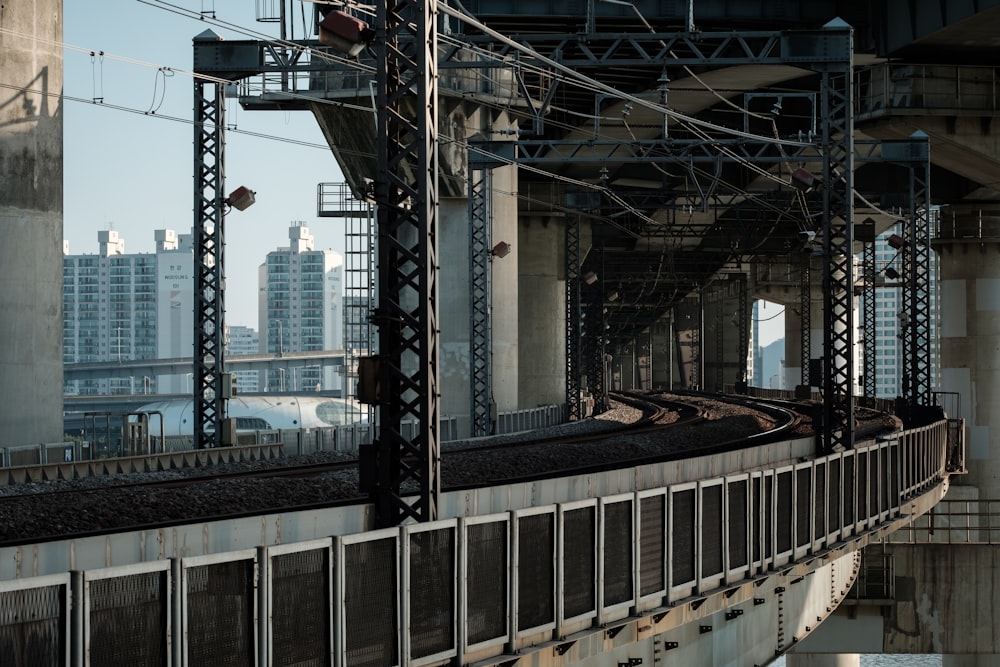 brown and white train on rail tracks during daytime