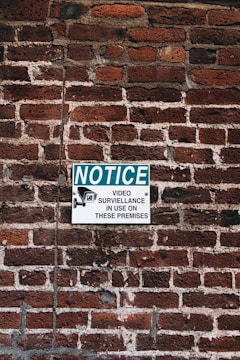 white and black wall mounted signage