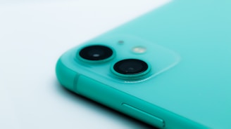 A clean, modern smartphone display showing product details on a navy and teal themed website.