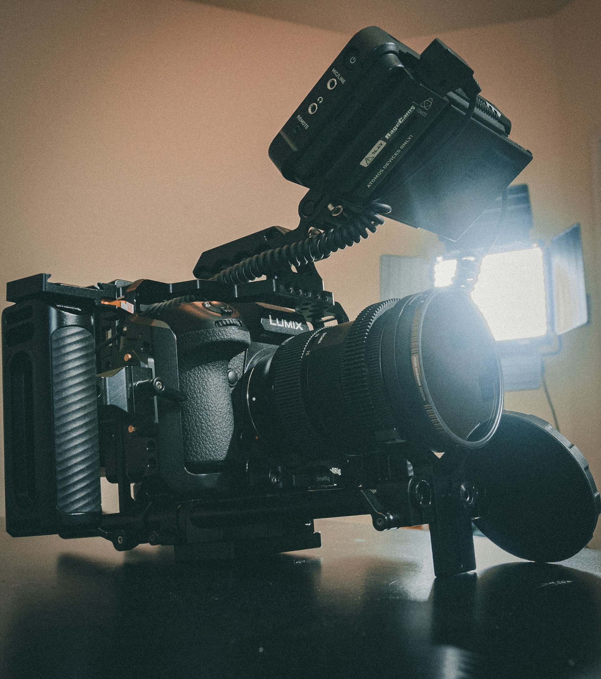 black dslr camera on black table