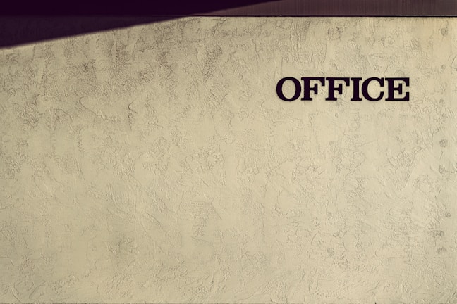 Modern office wall with vibrant branded graphic printed directly on the surface