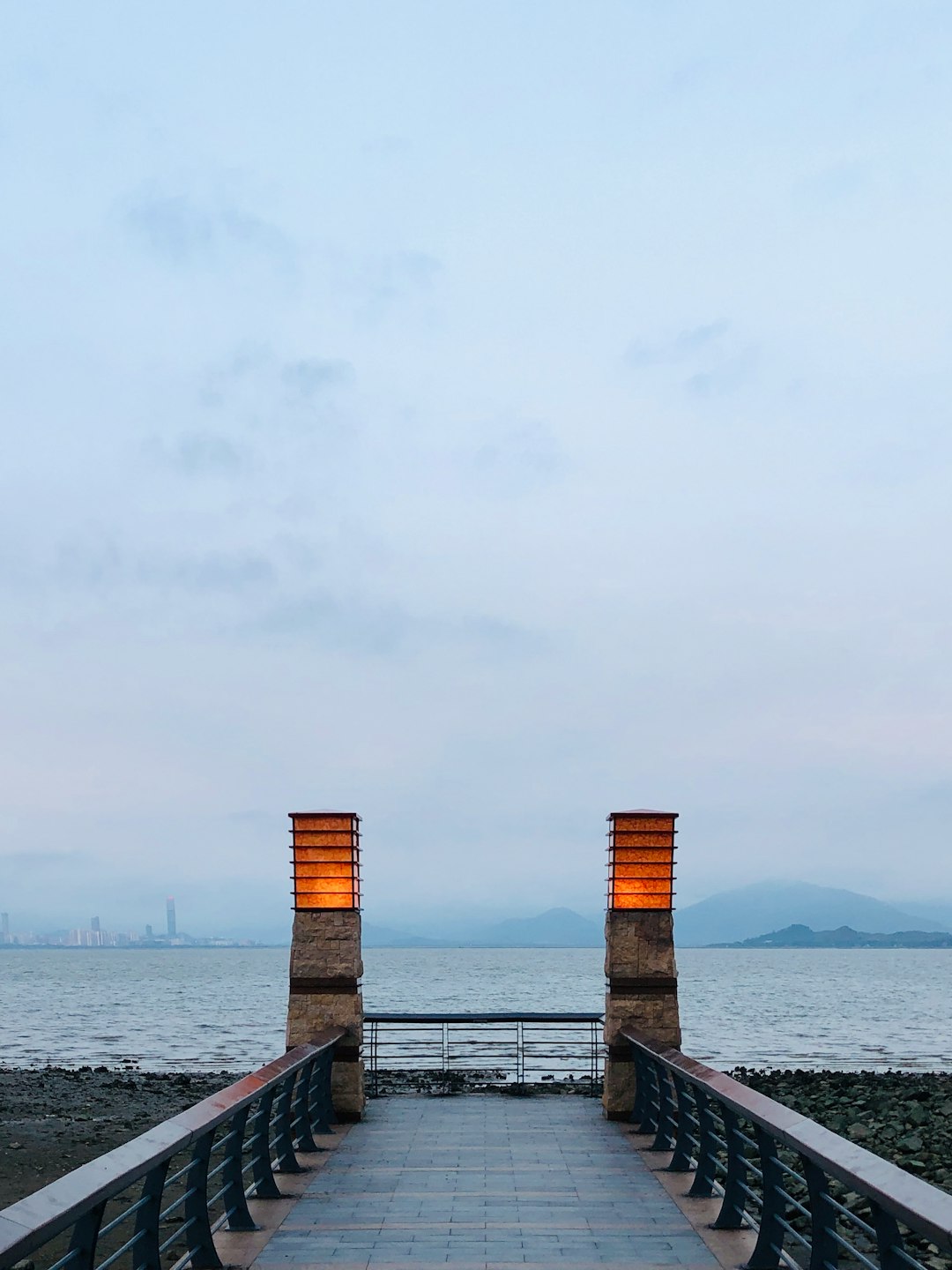 brown wooden dock on sea during daytime