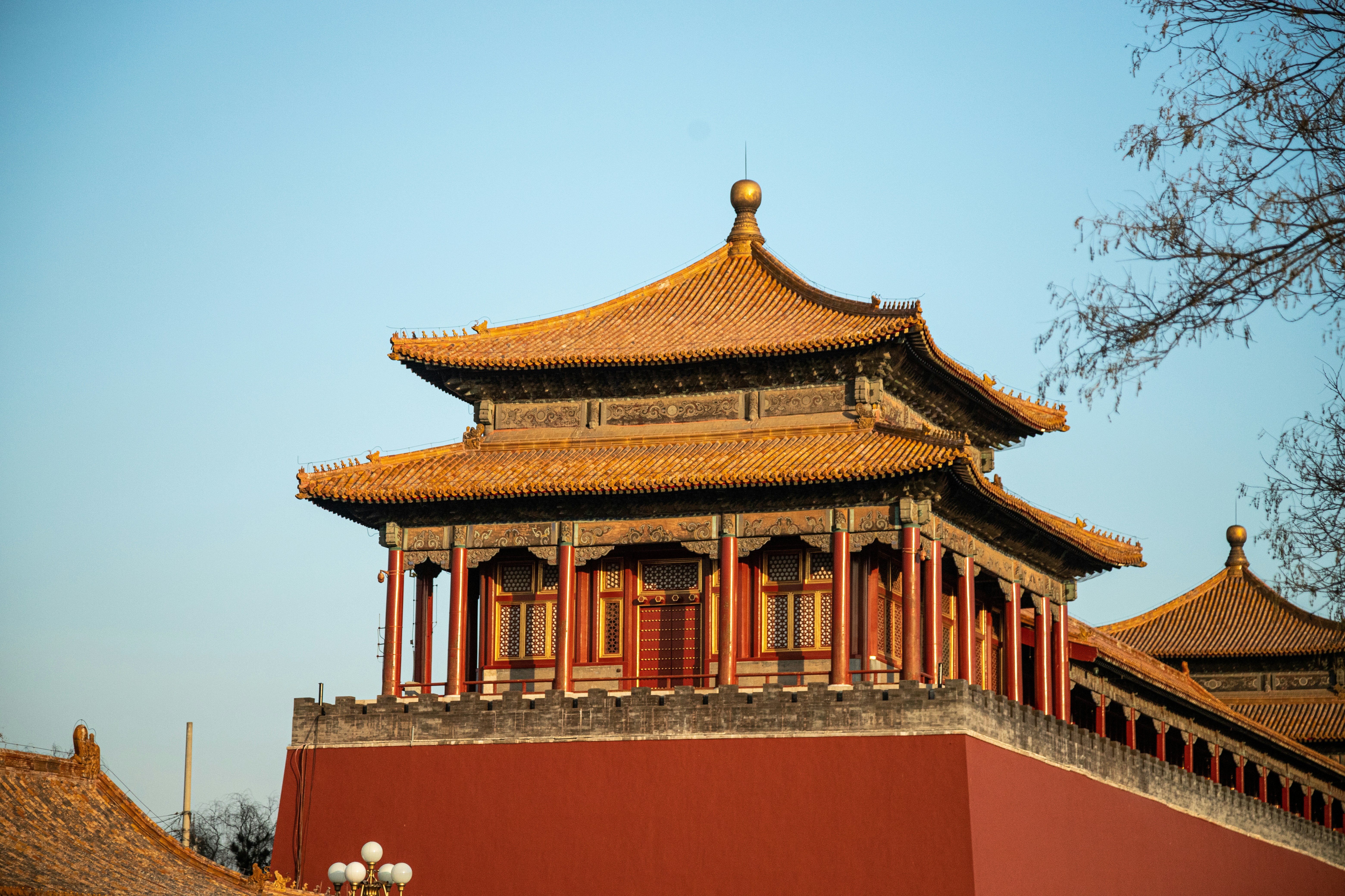 brown and white concrete building under blue sky during daytime