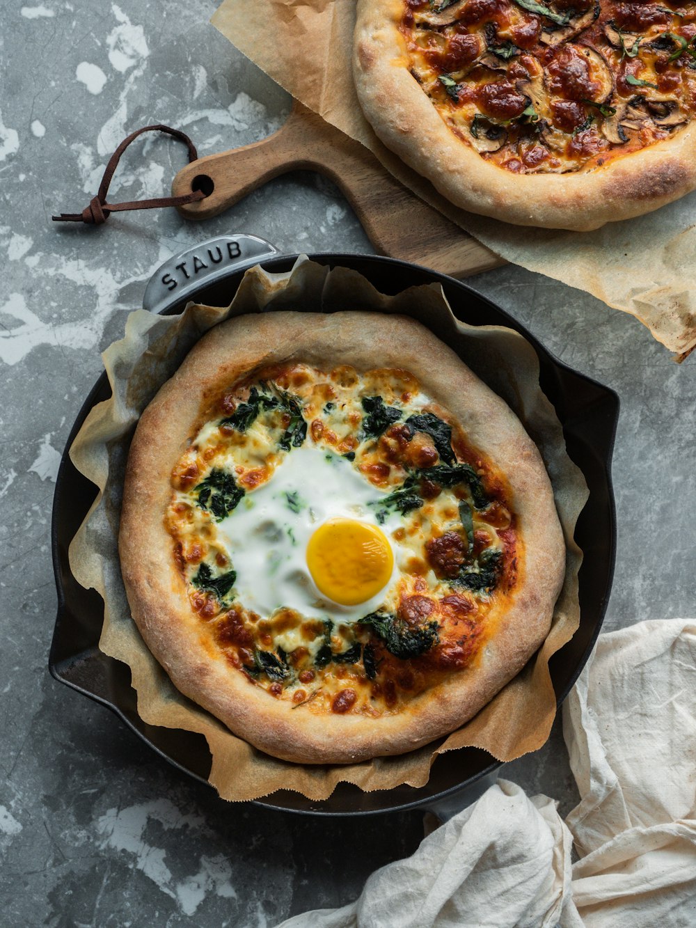 pizza on black round plate