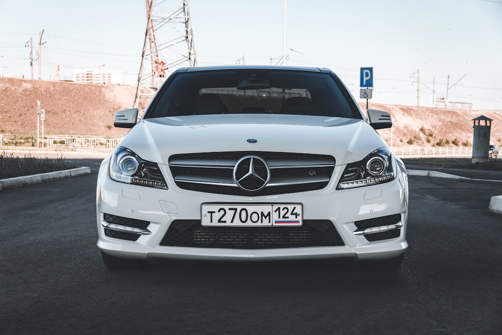 silver mercedes benz car on road during daytime