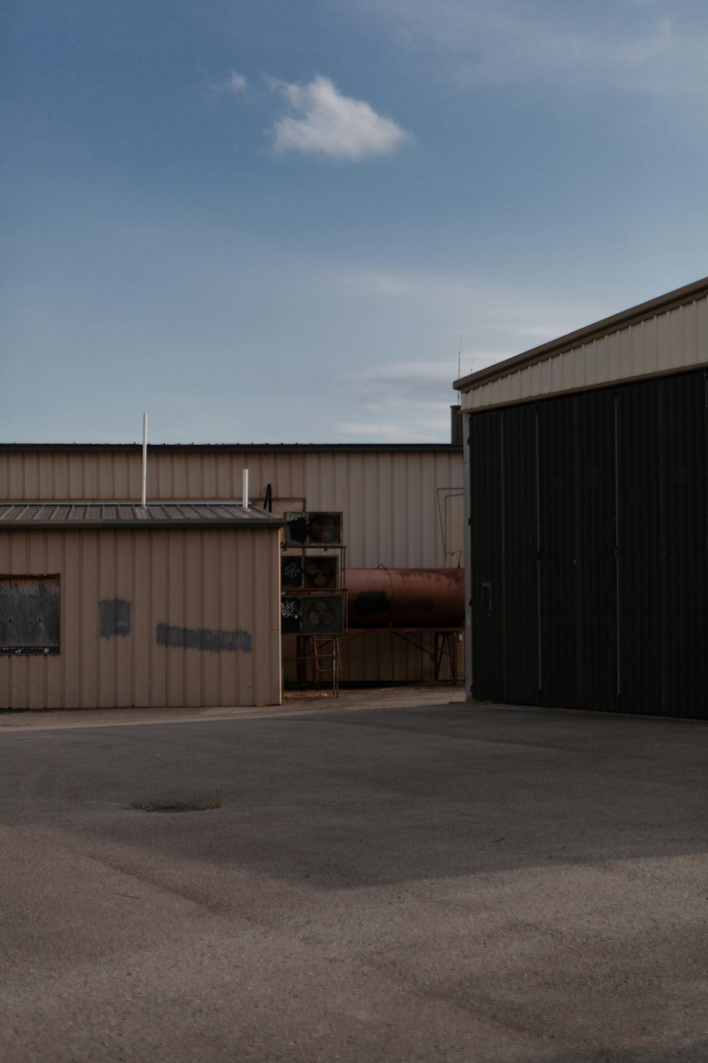 brown and gray steel building during daytime