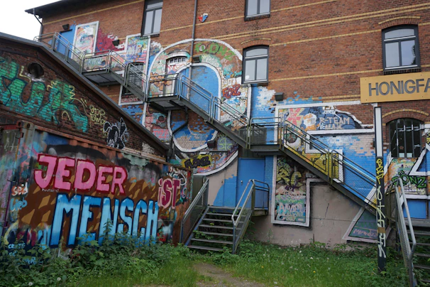 A striking graffiti art piece on a commercial building’s exterior, blending urban edge with artistic flair.