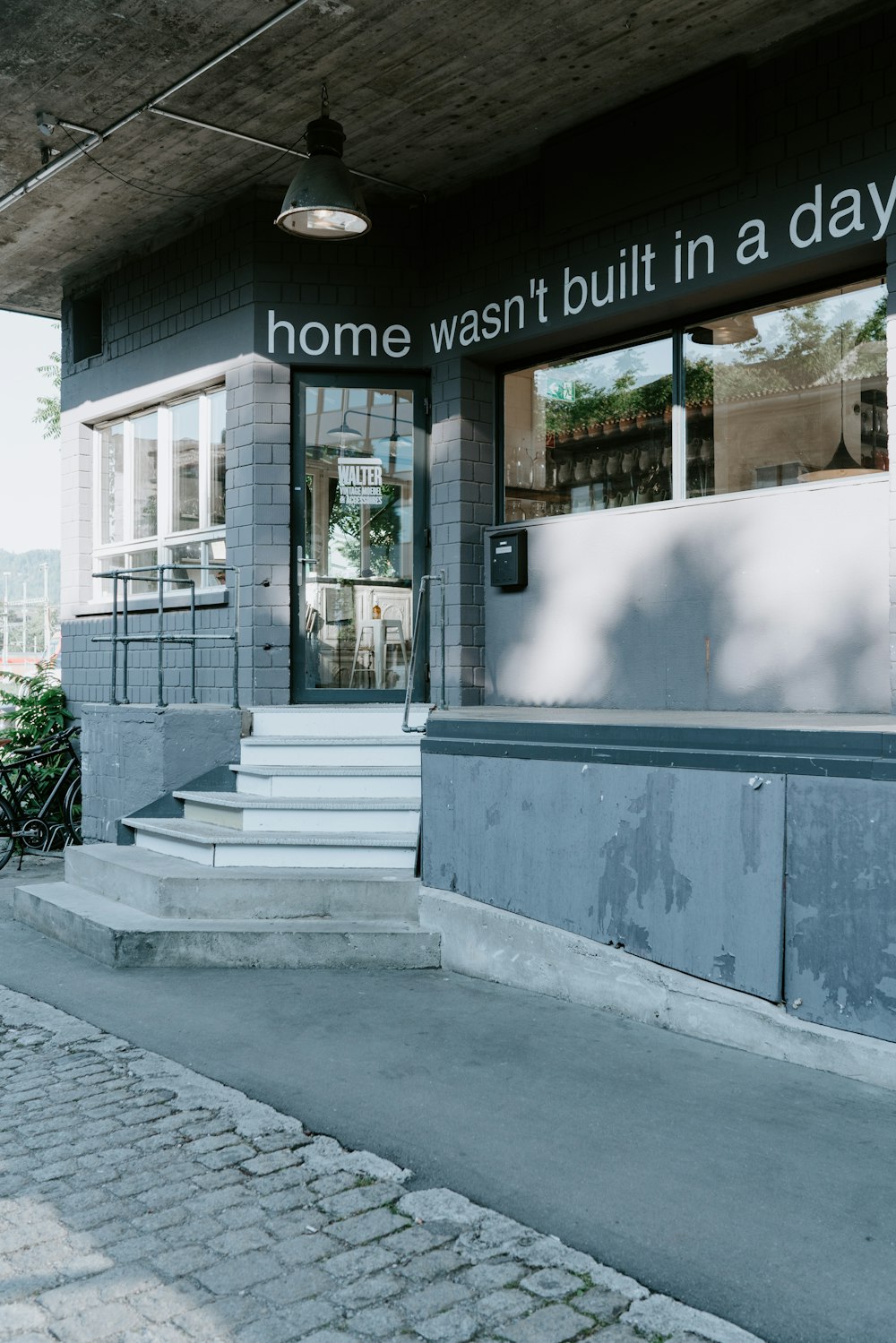 gray concrete building with glass window