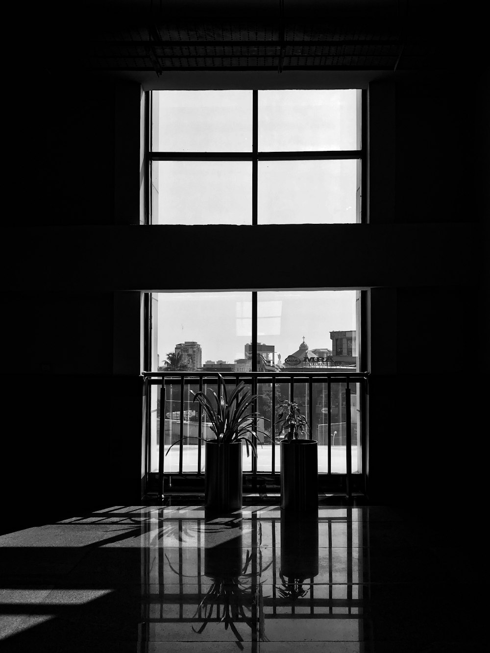 black framed glass window during daytime