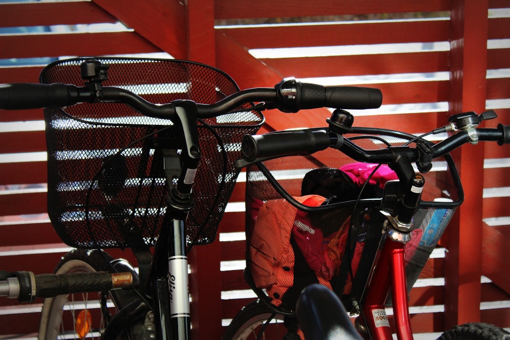 black and red bicycle with black and white bicycle