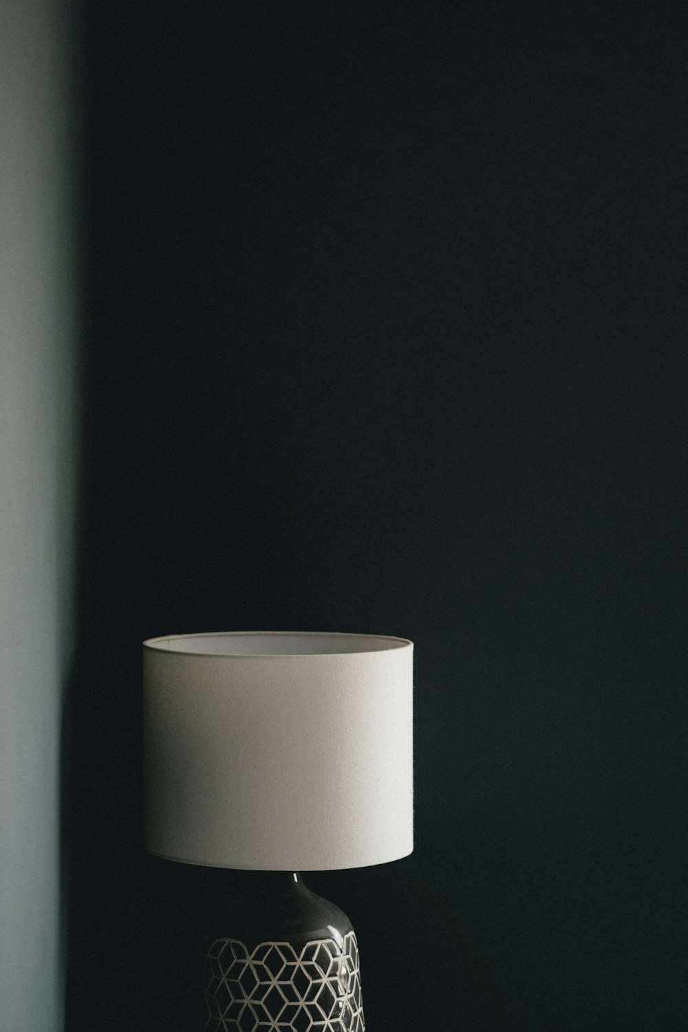 white toilet paper roll on black table photo – Free Lamp Image on Unsplash