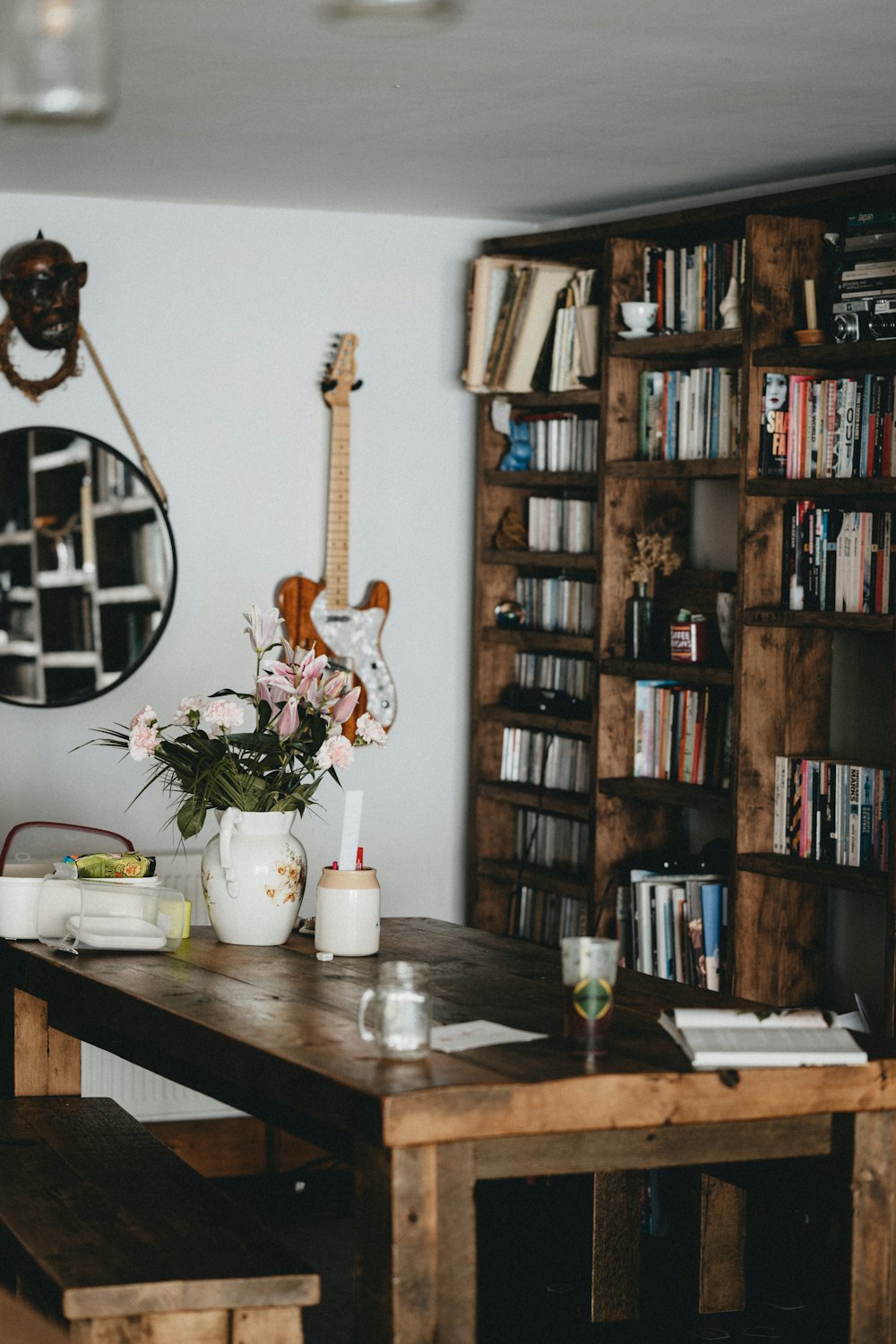 white ceramic mug on brown wooden table