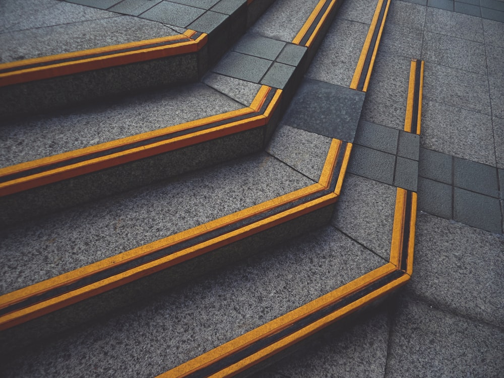 yellow and black concrete stairs