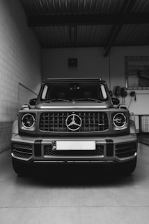 grayscale photo of mercedes benz car